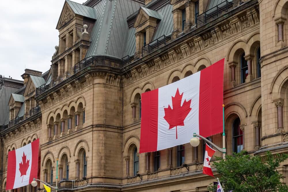 Canadian flags on building. Office of the Prime Minister and Privy Council