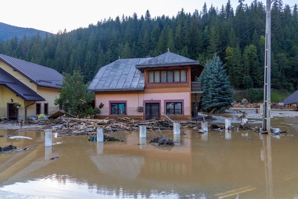 Flooded destroyed house following floods