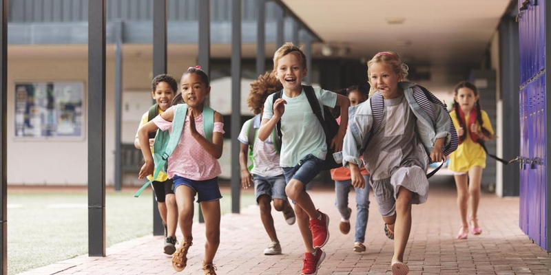 Kids racing and running at school