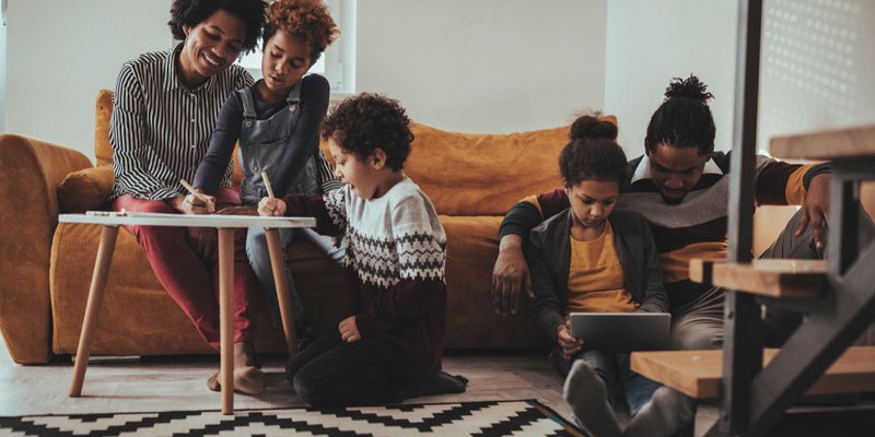 Family hanging out together in modern living room