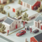 3D render of a neighbourhood full of EV cars and solar panels