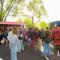 Happy crowds gather around food trucks
