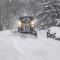 Toronto 2025-02-16 Snowplow clearing neighbourhood street during a snowstorm
