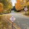 FedBoC-rate-hike-signs-quiet-road-fall-colours-frame-house
