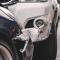 A close up image of a collision between a blue vehicle and white vehicle