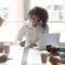 Signing contracts for services at group negotiations concept, diverse businesswomen seller and client company representatives partners making sale purchase business deal agreement at team meeting.jpg