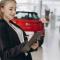 car dealership female worker in suit (1).jpg