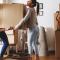 Couple moving into their new apartment