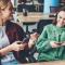 Young coworkers on their phones at a co-working space