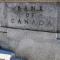 A large concrete wall with The Bank of Canada engraved on it