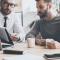 A young couple compare options regarding their finances