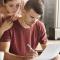 young couple distressed looking at bills_paying your mortgage after a job loss.jpg