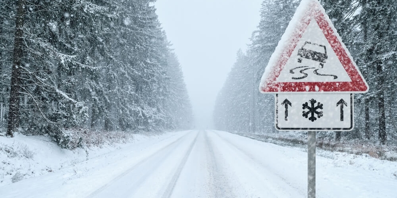 winter driving icy roads sign.jpg